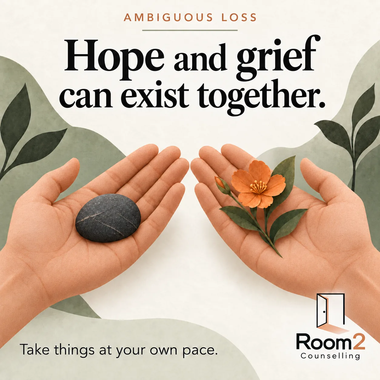Two matching open palms support a dark smooth stone and a small orange flowering sprig, surrounded by muted green leaves. Text: Ambiguous loss. Hope and grief can exist together. Take things at your own pace. Room2 Counselling logo at the bottom right.