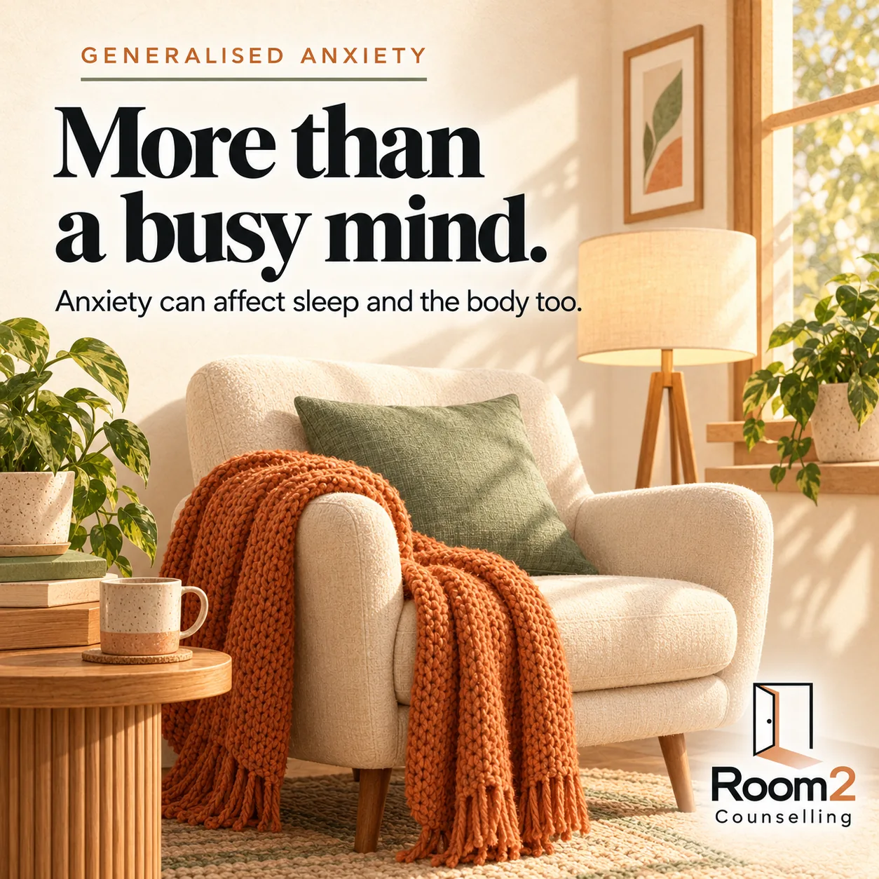 An ivory armchair with an orange blanket, sage cushion and softly lit lamp. Text: Generalised anxiety. More than a busy mind. Anxiety can affect sleep and the body too. Room2 Counselling logo.